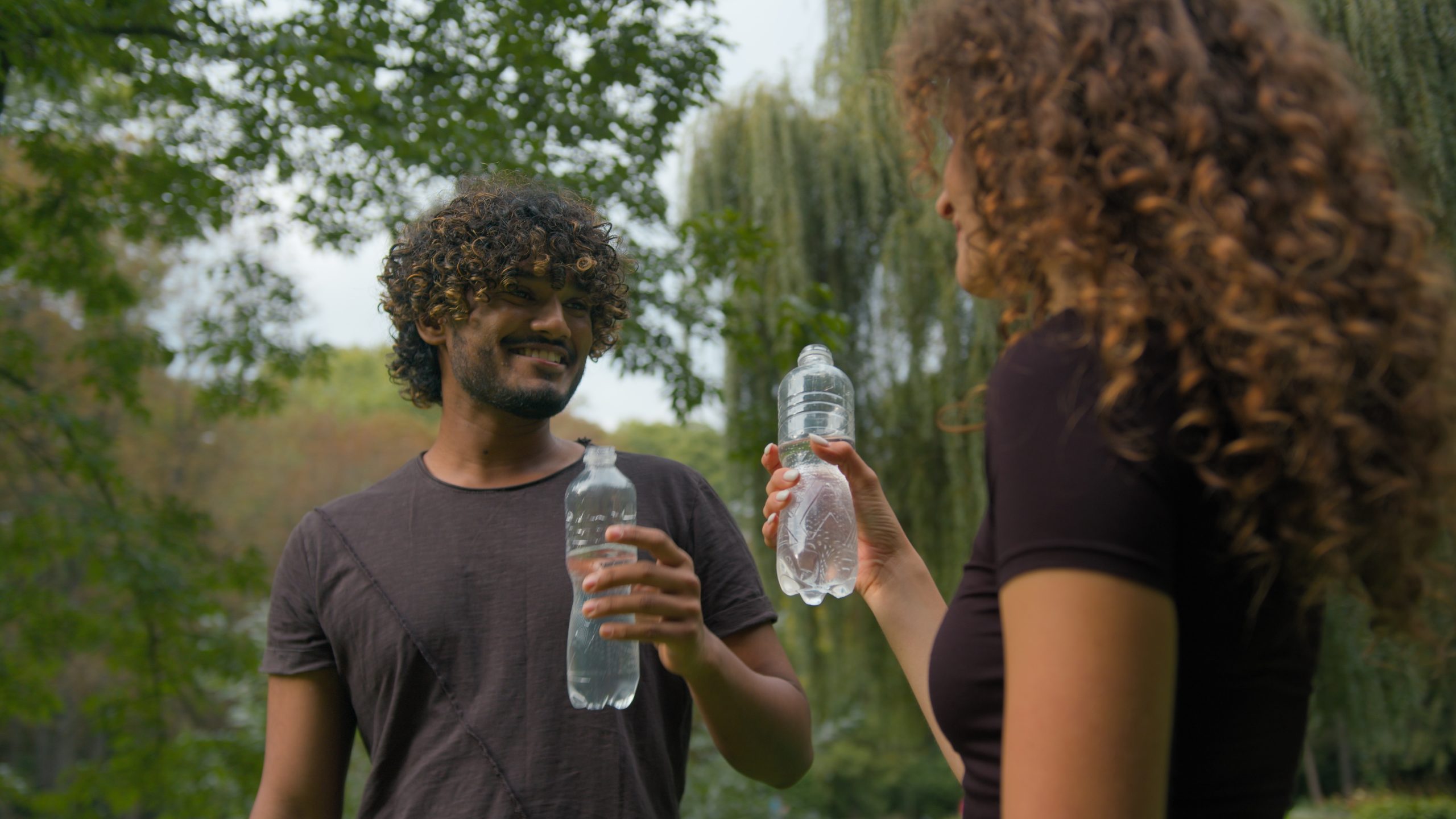 Sinelato Basadi Enterprise Man and Woman Drinking Purified Water.